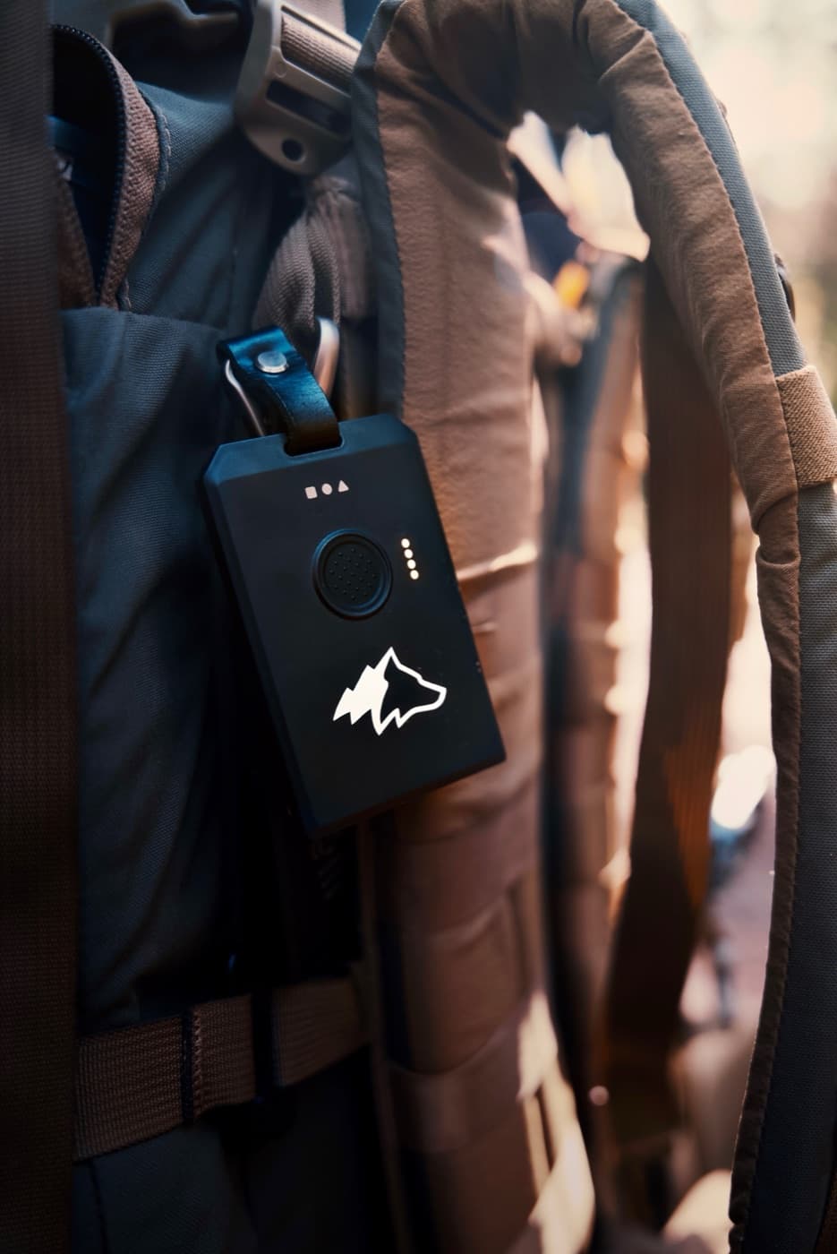 Kiba Scout radio clipped to a pack